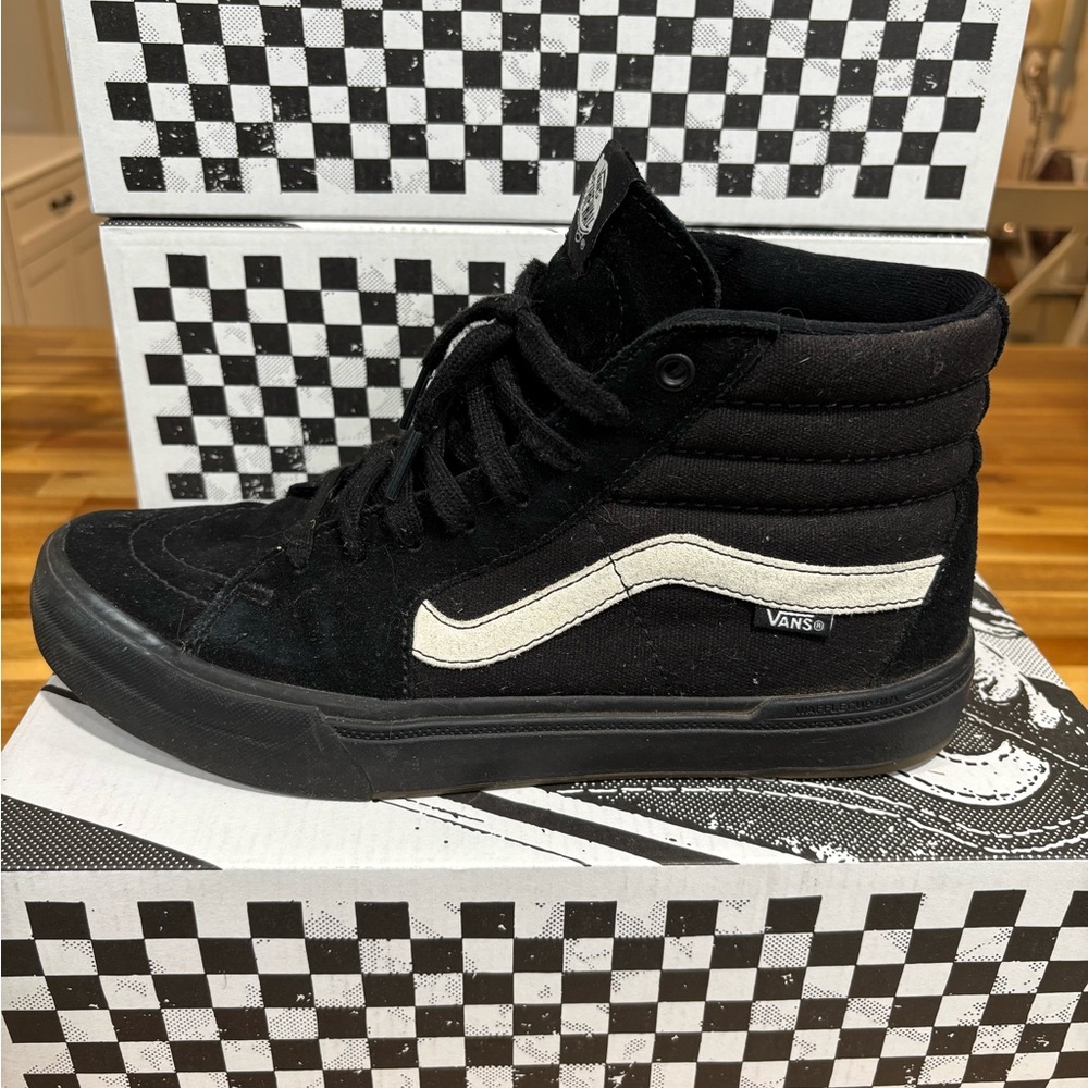 Vans Black and White High-Top Sneakers